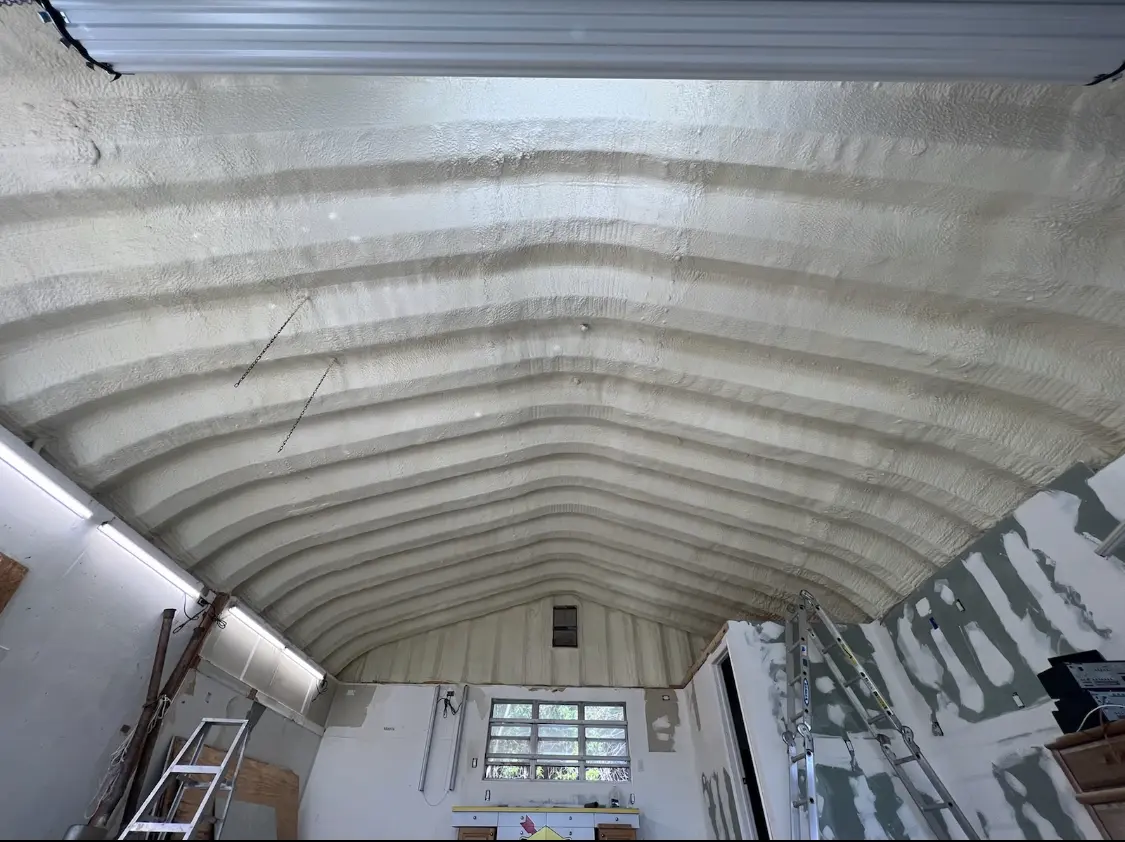 Spray polyurethane foam applied to the underside of a metal roof deck in Boise City